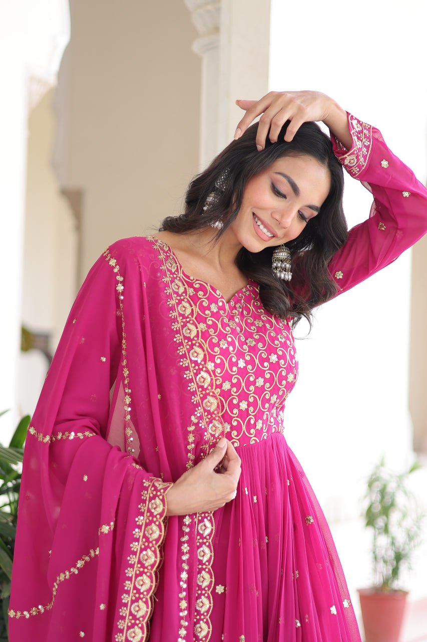 Evanik Rani Pink Faux Georgette with Rich Sequins & Zari Embroidered work Gown