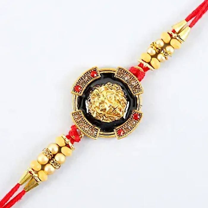 Traditional Lion Face Rakhi & 2 Dairy Milk Silk