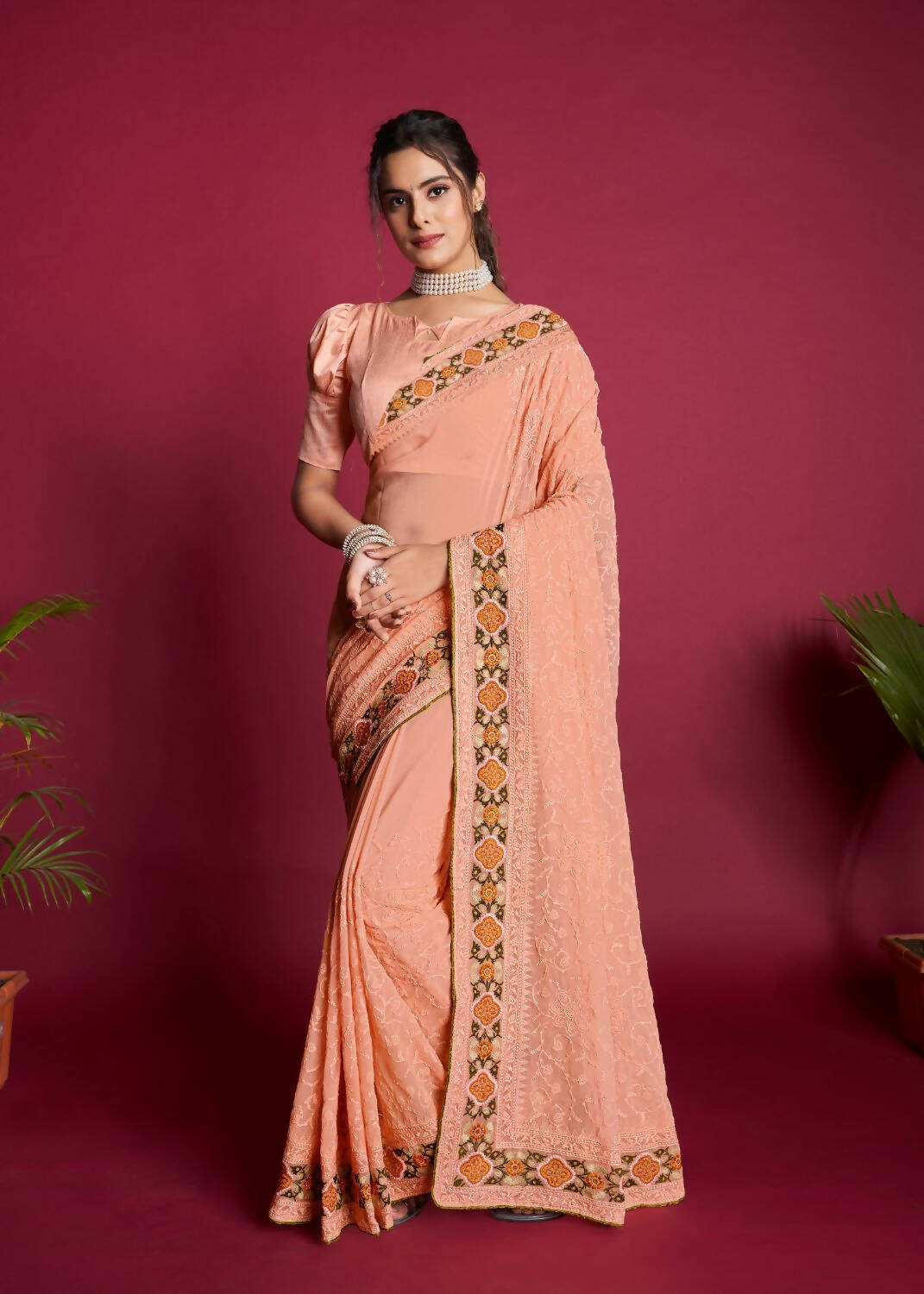 Vamsee Peach Georgette Designer Saree