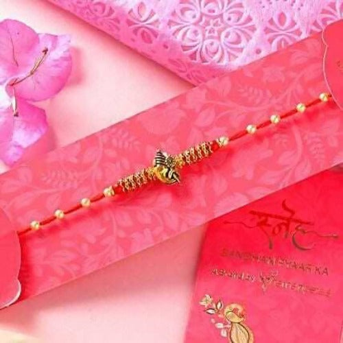 Ganesha Pearl Rakhi & Handmade Chocolate Truffle Combo