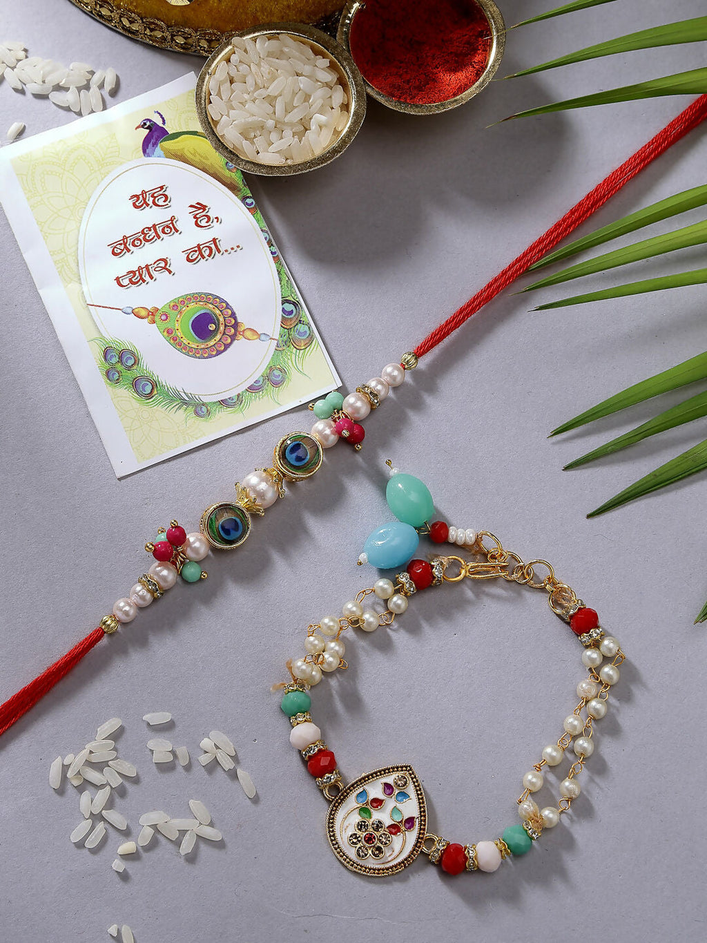 NVR Women & Men Set of 2 Multicolor Artificial Beads Bhaiya Bhabhi Rakhi With Roli Chawal & Chocolate