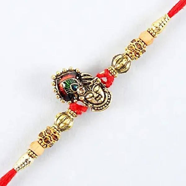 Serene Lord Krishna Rakhi & Cadbury Fruit N Nut