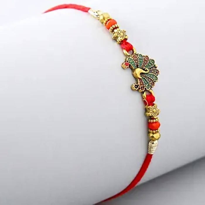 Beautiful Peacock Ethnic Rakhi & Soan Papdi