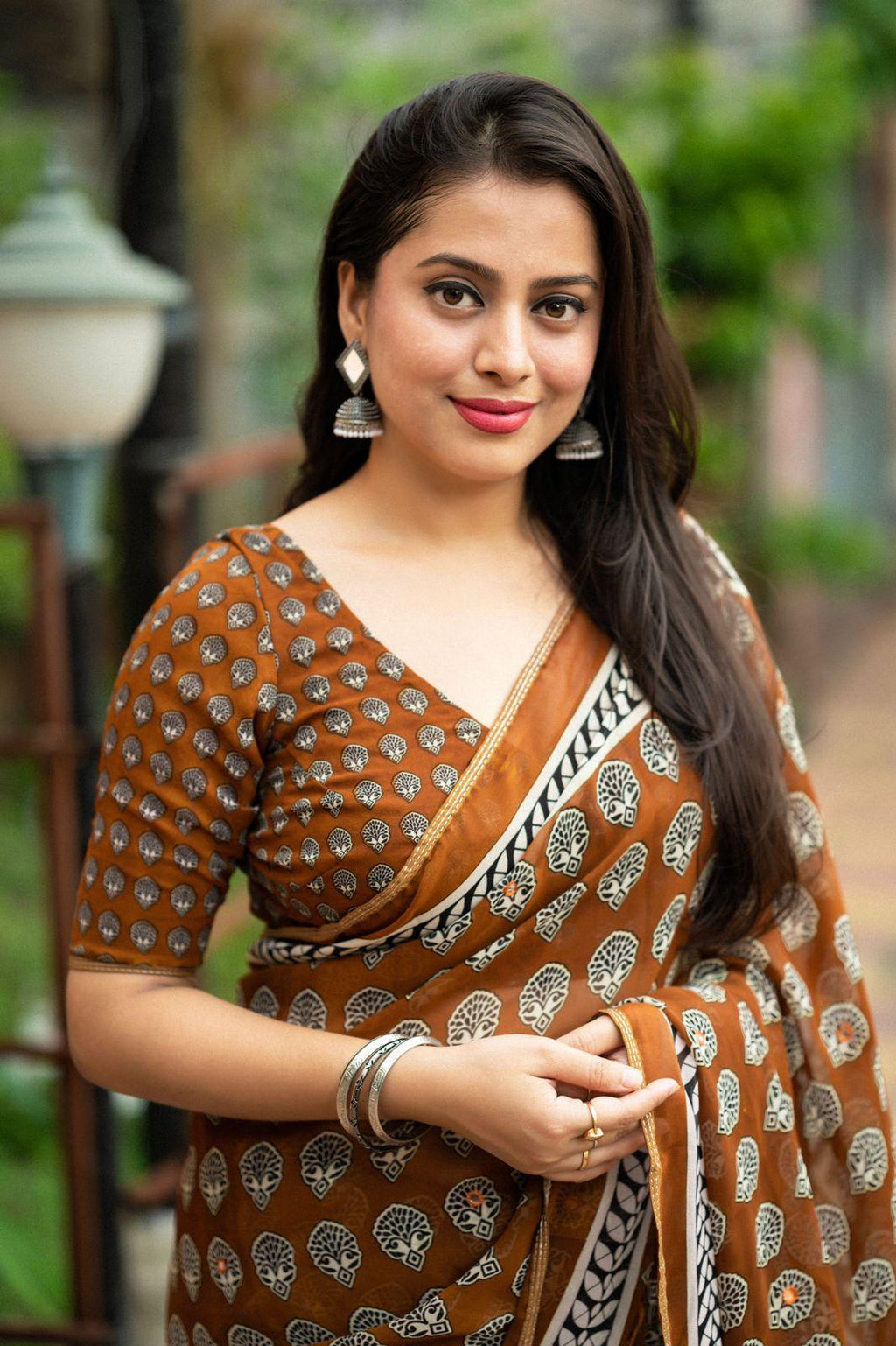 Mustard Poly Georgette Ajrak Saree with Unstitched Blouse - Hiral Fashion