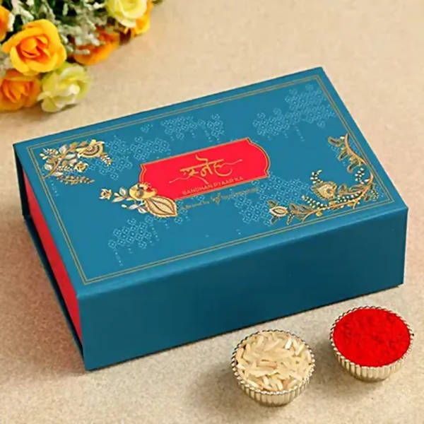 Om Pearl Bracelet Rakhi & Kaju Katli Box