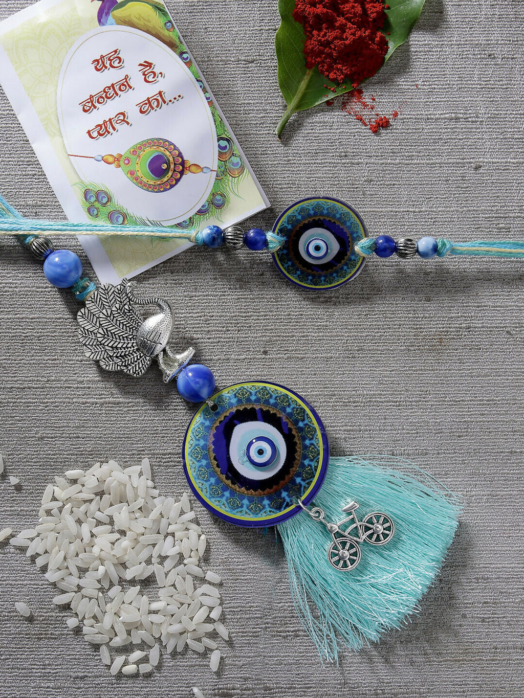 NVR Women & Men Set of 2 Blue Evil Eye & Beaded Bhaiya Bhabi Rakhi With Roli Chawal & Chocolate