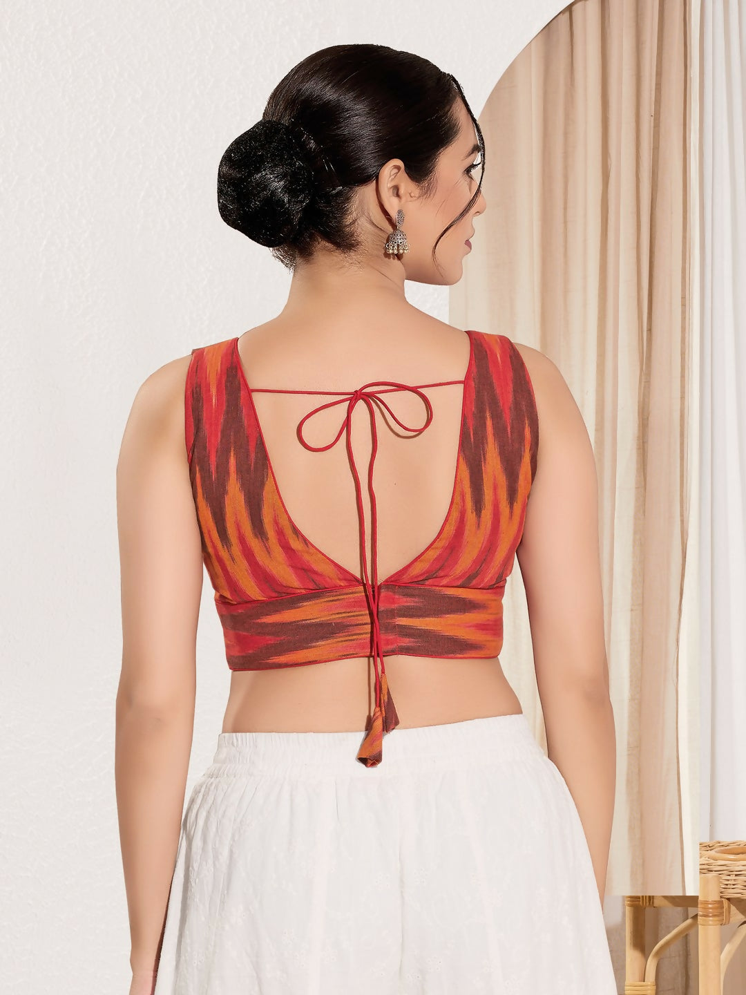 Joban Fashion Red Ikat Silk Padded Blouse With V Neck Sleeveless