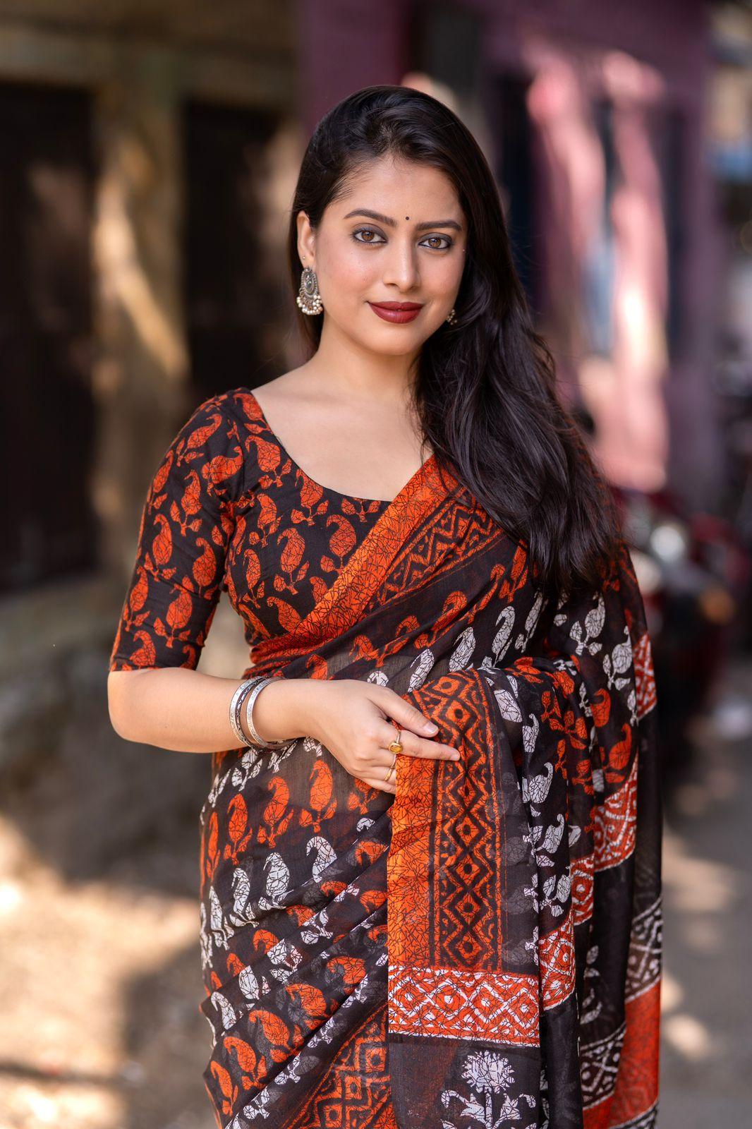 Orange Linen Blend Ethnic Motifs Saree with Unstitched Blouse - Hiral Fashion