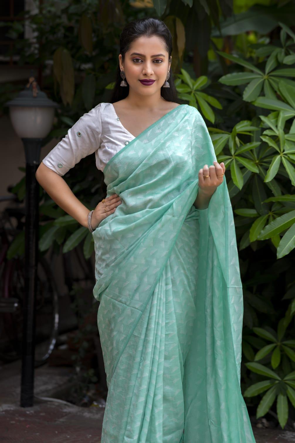 Green Poly Georgette Woven Design Saree with Unstitched Blouse - Hiral Fashion
