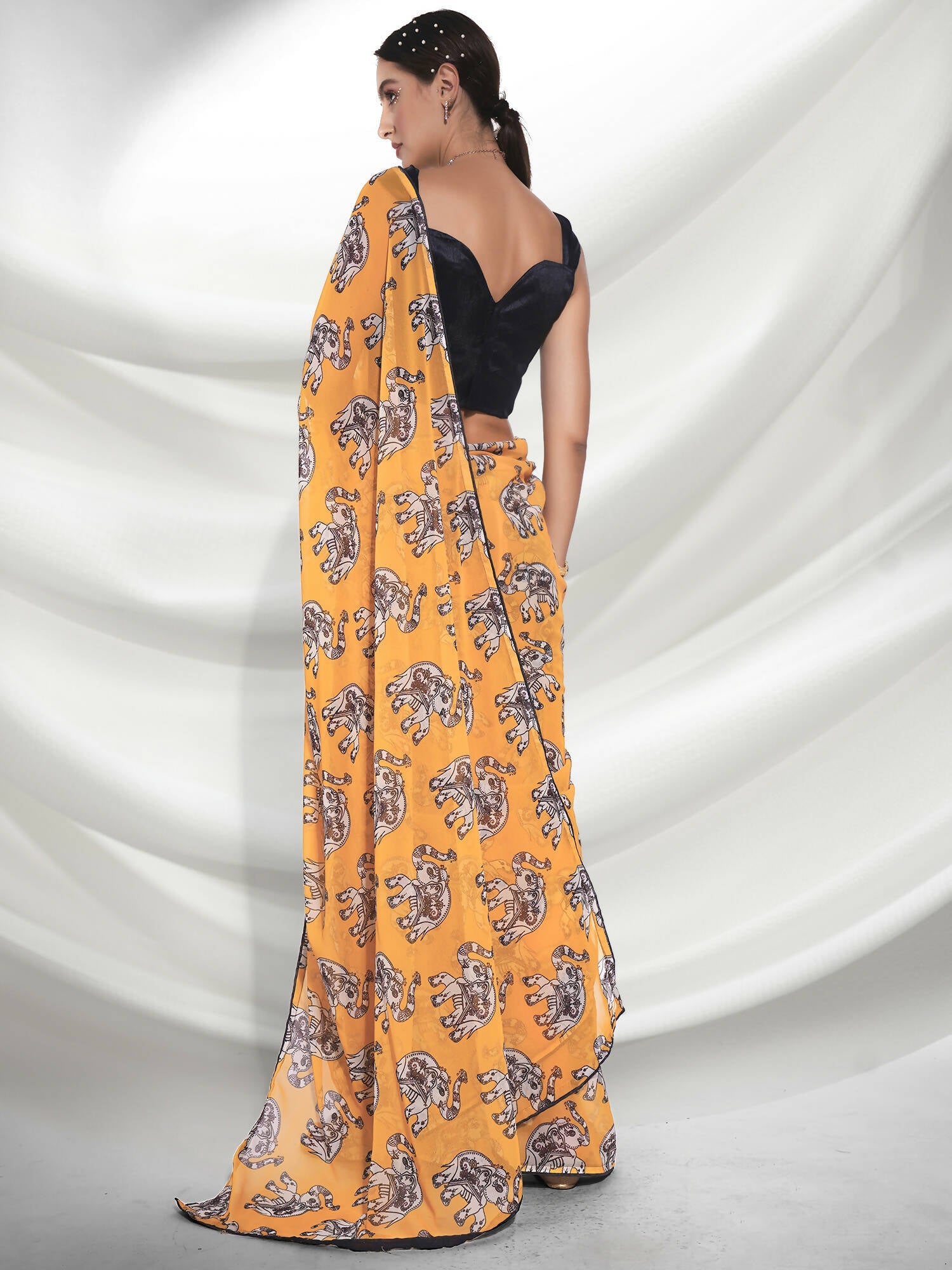 Yellow Georgette Animal Printed Saree With Unstitched Blouse Piece - Rajal