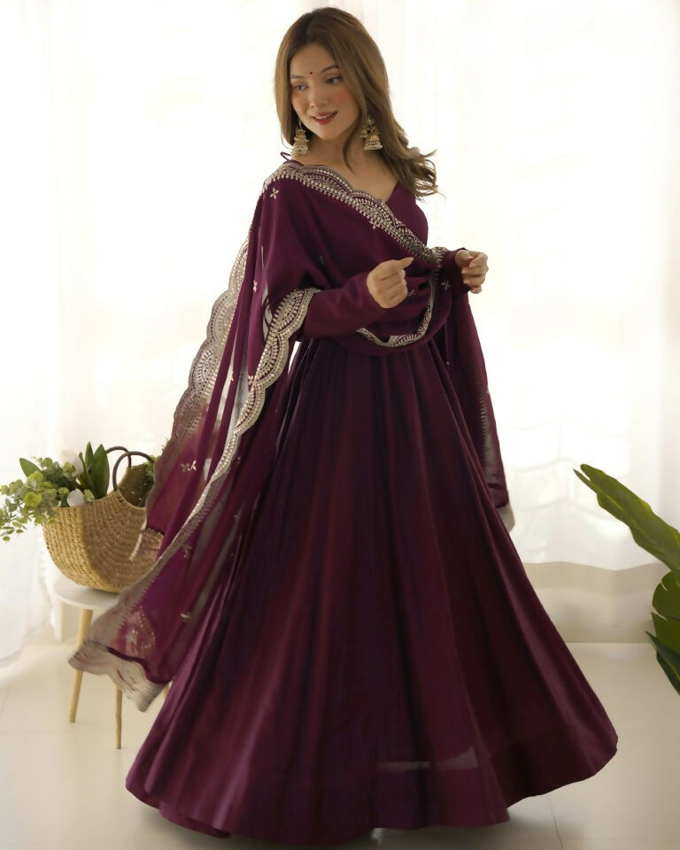 Teeya Creation Wine Color Pure Roman Silk Chanderi Party Wear Fully Stitched Gown