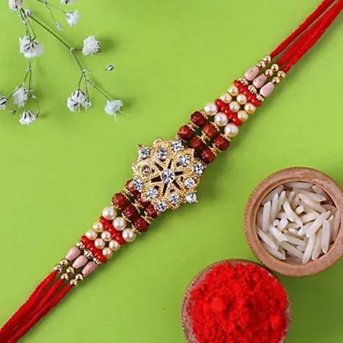 Pretty Rudraksha Rakhi And Cashew Jar
