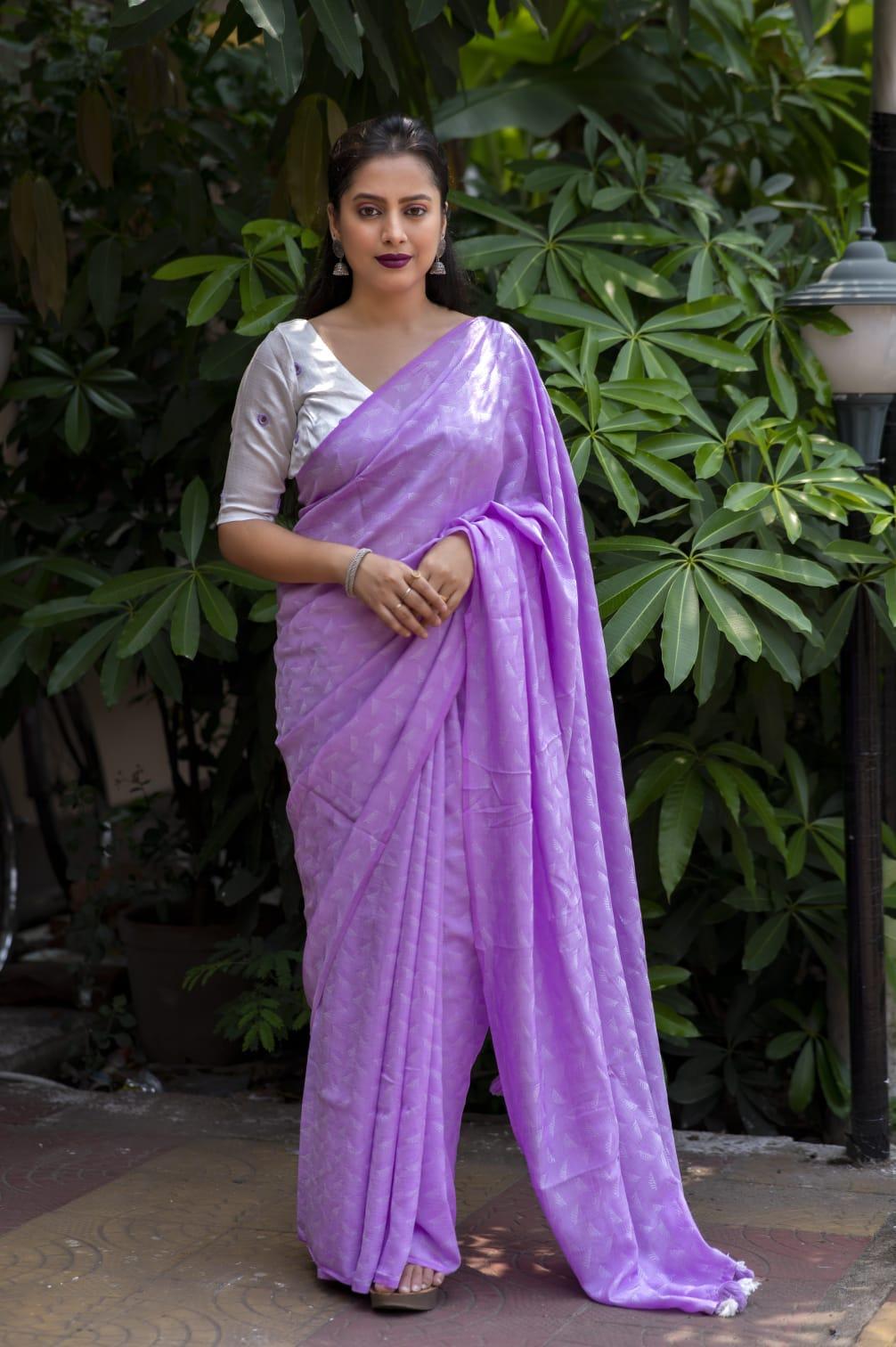 Lavender Poly Georgette Woven Design Saree with Unstitched Blouse - Hiral Fashion